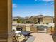Charming front patio area with cozy seating and views of the surrounding neighborhood at 16756 S 181St Ln, Goodyear, AZ 85338