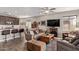 Spacious open-concept living room with tile floors and ample seating at 16756 S 181St Ln, Goodyear, AZ 85338