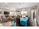Open concept living and dining area, offering a spacious layout for entertaining and relaxation at 16756 S 181St Ln, Goodyear, AZ 85338