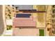 An aerial view of a single Gathering home with solar panels and defined property lines at 16824 W Alice Ave, Waddell, AZ 85355