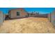 Expansive backyard offers plenty of space to create your ideal outdoor living space at 16824 W Alice Ave, Waddell, AZ 85355