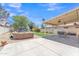 Expansive backyard with patio cover, comfortable seating, and a basketball hoop at 17425 N 1St Dr, Phoenix, AZ 85023
