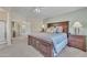 Well-lit main bedroom featuring soft carpet and tasteful furniture at 17425 N 1St Dr, Phoenix, AZ 85023