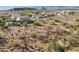 An aerial view of the neighborhood showcasing desert landscaping and stunning mountain views at 18121 E San Luis Dr, Gold Canyon, AZ 85118