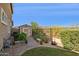 Well-maintained backyard featuring a garden area, shed, and landscaping, offering a serene outdoor retreat at 18121 E San Luis Dr, Gold Canyon, AZ 85118