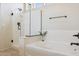 Clean bathroom featuring a bathtub and a shower with glass door at 18121 E San Luis Dr, Gold Canyon, AZ 85118