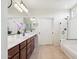 Bathroom featuring double vanity, a shower, and a bathtub at 18121 E San Luis Dr, Gold Canyon, AZ 85118