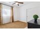 Bedroom featuring carpet, curtains, and closet with sliding doors at 18121 E San Luis Dr, Gold Canyon, AZ 85118