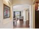 Entryway showcasing hardwood floors flowing into a living area with large windows and a staircase at 18121 E San Luis Dr, Gold Canyon, AZ 85118