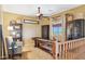 Upstairs game room with a shuffleboard table, bookcases, and seating area at 18121 E San Luis Dr, Gold Canyon, AZ 85118