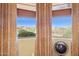 Window view showcasing the outdoor scenery at 18121 E San Luis Dr, Gold Canyon, AZ 85118