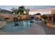 Scenic pool area showcasing ambient lighting, desert flora, and privacy, offering a tranquil experience at 18121 E San Luis Dr, Gold Canyon, AZ 85118