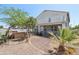 Large backyard showing desert landscaping, and a covered patio at 19182 N Smith Dr, Maricopa, AZ 85139