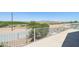 Balcony view overlooking serene fields and distant mountains at 19182 N Smith Dr, Maricopa, AZ 85139