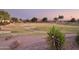 The community park boasts a walking path, green space, and desert landscaping at 19182 N Smith Dr, Maricopa, AZ 85139
