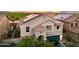 Charming two-story home featuring a private driveway, desert landscaping and an attached two-car garage at 19182 N Smith Dr, Maricopa, AZ 85139