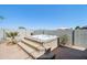 Backyard with a built-in hot tub surrounded by brick pavers and block walls at 19182 N Smith Dr, Maricopa, AZ 85139