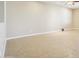 Empty living room showcasing tile flooring, neutral paint, and modern electrical outlets at 19182 N Smith Dr, Maricopa, AZ 85139