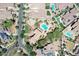 Aerial view of home featuring lush landscaping, pool/spa, putting green, and charming desert aesthetics at 20409 W Thayer St, Buckeye, AZ 85396
