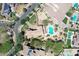 Aerial view of home featuring lush landscaping, pool/spa, putting green, and charming desert aesthetics at 20409 W Thayer St, Buckeye, AZ 85396