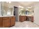 Dual vanity bathroom features ample counter space and great lighting at 20409 W Thayer St, Buckeye, AZ 85396