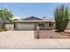 Charming single-story brick home with a two-car garage, and xeriscaping at 2119 E Sesame St, Tempe, AZ 85283
