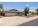 Charming single-story brick home with a two-car garage, and xeriscaping at 2119 E Sesame St, Tempe, AZ 85283