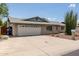 Charming single-story brick home with a two-car garage, and xeriscaping at 2119 E Sesame St, Tempe, AZ 85283
