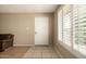 Entry way with tile floor and security door provides lots of light with window at 2119 E Sesame St, Tempe, AZ 85283