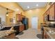 Well-equipped kitchen with granite countertops, modern appliances, and plenty of storage space at 2124 W Harwell Rd, Phoenix, AZ 85041