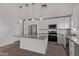 Bright kitchen with stainless steel appliances, granite countertops, and tile backsplash at 22039 N 35Th Dr, Glendale, AZ 85310