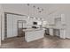 Bright and modern kitchen with stainless steel appliances and granite countertops at 22039 N 35Th Dr, Glendale, AZ 85310
