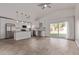 Bright and airy open-concept kitchen with stainless steel appliances and granite countertops at 22039 N 35Th Dr, Glendale, AZ 85310