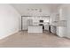 Bright open-concept kitchen with stainless steel appliances and granite countertops at 22039 N 35Th Dr, Glendale, AZ 85310