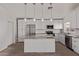 Bright and modern kitchen with stainless steel appliances and granite countertops at 22039 N 35Th Dr, Glendale, AZ 85310