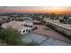 Spacious property with a tennis court, green area and well-maintained landscaping in a quiet neighborhood at 3126 E Fruitvale Ct, Gilbert, AZ 85297