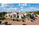 Aesthetic single-story home exhibits beautiful landscaping, masonry, and symmetrical architecture at 3126 E Fruitvale Ct, Gilbert, AZ 85297