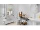 Powder room featuring pedestal sink, decorative table and access to the outdoors at 3126 E Fruitvale Ct, Gilbert, AZ 85297