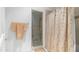 Neutral-toned bathroom featuring a glass-enclosed shower and towel set at 3126 E Fruitvale Ct, Gilbert, AZ 85297