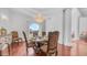 Dining room features a chandelier, table for six, and exterior access at 3126 E Fruitvale Ct, Gilbert, AZ 85297