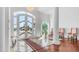 Elegant foyer with marble and hardwood floors, statement columns, and views of the outside at 3126 E Fruitvale Ct, Gilbert, AZ 85297