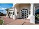 Up close exterior of attractive home featuring arched windows, masonry, and a decorative front door at 3126 E Fruitvale Ct, Gilbert, AZ 85297