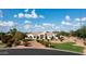 Expansive home featuring mature landscaping, paver driveway, and charming curb appeal at 3126 E Fruitvale Ct, Gilbert, AZ 85297