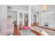 Spacious living room with hardwood floors, statement columns, elegant decor, and grand chandelier at 3126 E Fruitvale Ct, Gilbert, AZ 85297