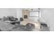 Cozy media room with a large screen, comfortable seating, and ambient lighting, designed for entertainment at 3126 E Fruitvale Ct, Gilbert, AZ 85297