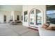 Spacious covered patio with comfortable seating and dining area, perfect for outdoor entertaining at 3126 E Fruitvale Ct, Gilbert, AZ 85297