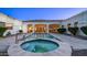 Backyard with a sparkling pool and jacuzzi, plus a covered patio for relaxation and enjoyment at 3126 E Fruitvale Ct, Gilbert, AZ 85297