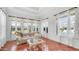 Seating area features coffered ceilings, hardwood floors, and abundant natural light at 3126 E Fruitvale Ct, Gilbert, AZ 85297