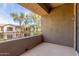 Relaxing balcony with views of lush greenery and neighborhood scenery for serene outdoor enjoyment at 3131 E Legacy Dr # 2113, Phoenix, AZ 85042