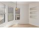 Bright bonus room shows wood-look floors and multiple windows for lots of natural light at 3131 E Legacy Dr # 2113, Phoenix, AZ 85042